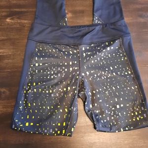 Under Armour tights, size Medium, black and yellow